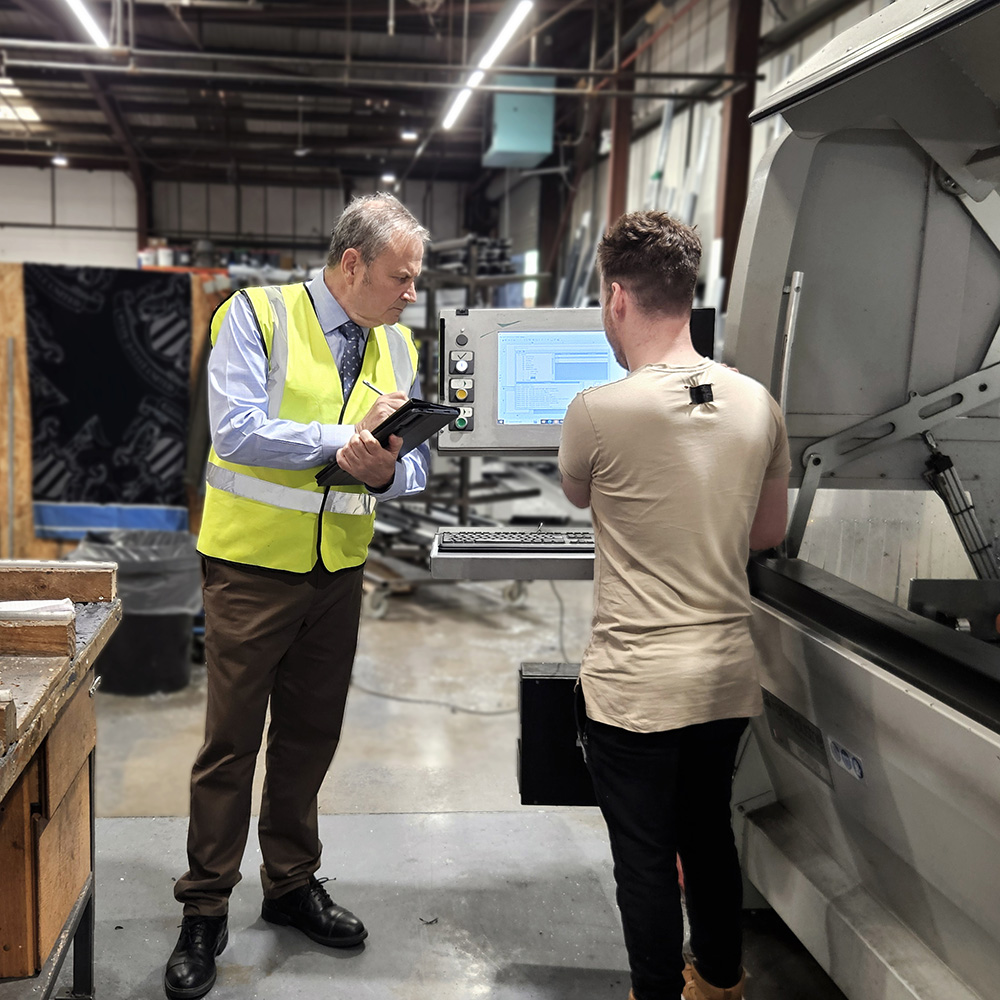 Stephen Collings supporting factory staff